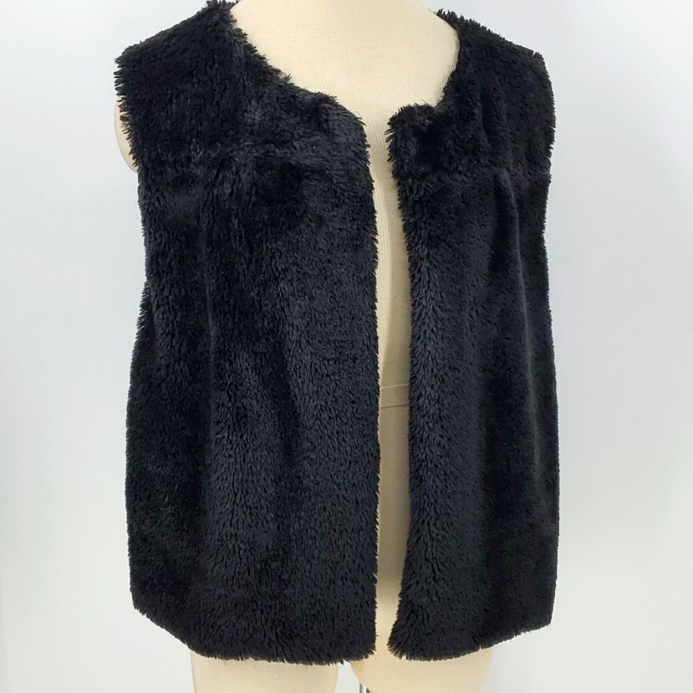 Black faux fur‎ vest, by Cejon. Large and super soft and cozy. Great condition.